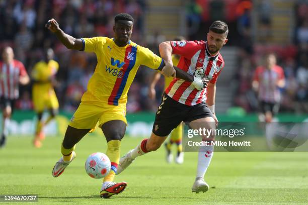 Marc Guehi of Crystal Palace is challenged by Shane Long of Southampton during the Premier League match between Southampton and Crystal Palace at St...