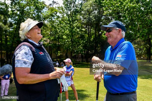 Laura Davies of the United Kingdom laughs with Dave Stockton of the United States on the 10th hole during the Greats of Golf competition at the...