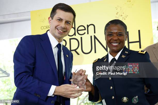 Sec. Pete Buttigieg presents Lt. General Donna Martin with the 2022 Courage Award during the 27th Annual White House Correspondents' Weekend Garden...