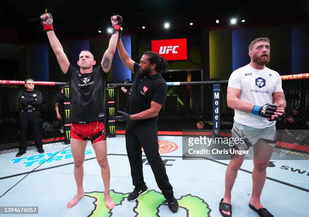 Krzysztof Jotko of Poland reacts after his victory over Gerald Meerschaert in a middleweight fight during the UFC Fight Night event at UFC APEX on...