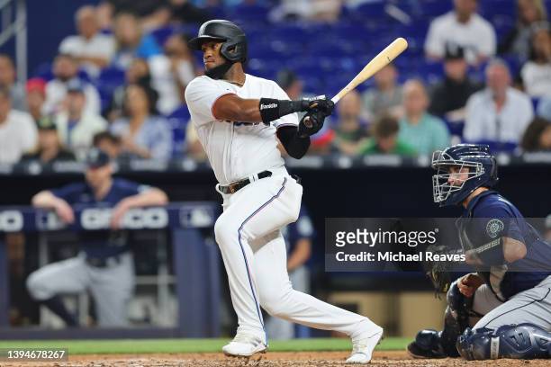 Bryan De La Cruz of the Miami Marlins hits a RBI single during the fifth inning against the Seattle Mariners at loanDepot park on April 30, 2022 in...