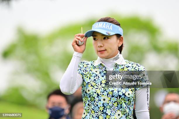 Chie Arimura of Japan acknowledges as she is introduced on the 1st tee during the final round of Panasonic Open Ladies at Hamano Golf Club on May 1,...