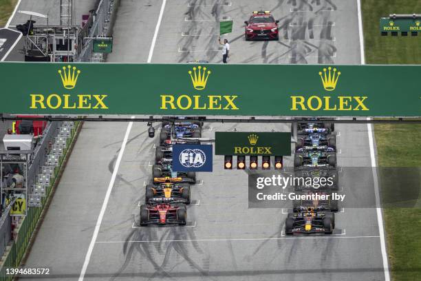 Start of the race with Charles Leclerc of Monaco and Ferrari and Max Verstappen of Netherlands and Red Bull in the first row during the F1 Grand Prix...