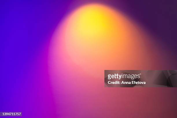 blurred colorful neon background with abstract shadows and lights pattern. copy space for your design. trendy colors of the year. - neon circle stock pictures, royalty-free photos & images