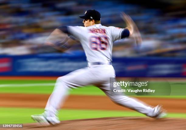 Phil Maton of the Houston Astros delivers a pitch during a MLB game against the Toronto Blue Jays at Rogers Centre on April 29, 2022 in Toronto,...
