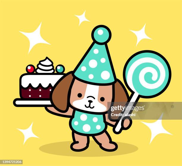 ein süßer hund, der einen partyhut trägt und einen kuchen und einen lutscher in pastelltönen trägt - hundeknochen stock-grafiken, -clipart, -cartoons und -symbole