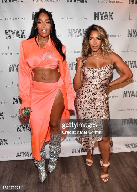 Marlo Hampton and Sheree Whitfield attend A Posh Peach Dinner: Celebrating Marlo Hampton at Tribeca Restaurant on April 30, 2022 in Atlanta, Georgia.