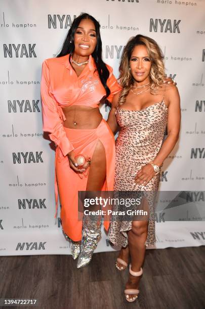 Marlo Hampton and Sheree Whitfield attend A Posh Peach Dinner: Celebrating Marlo Hampton at Tribeca Restaurant on April 30, 2022 in Atlanta, Georgia.