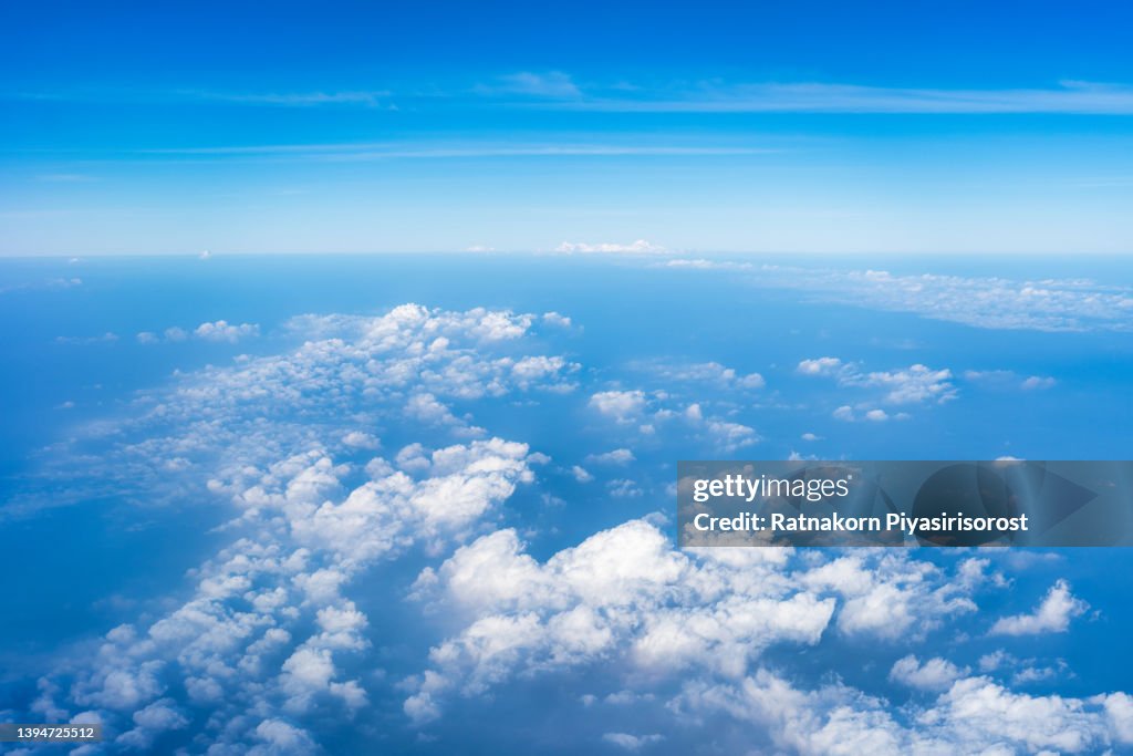 Sea Of Clouds above the stratosphere view from airplane window