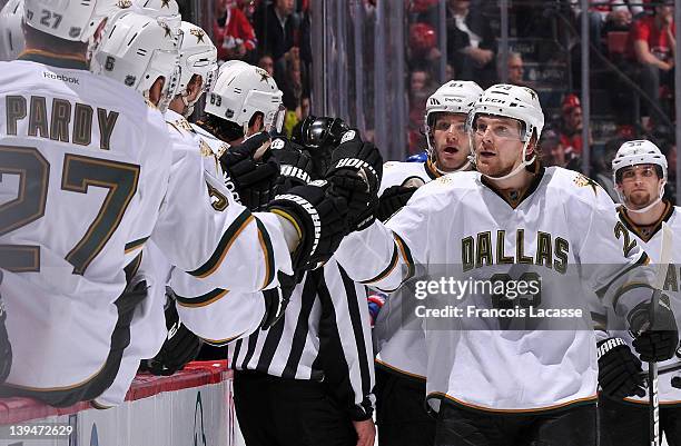 Tom Wandell of the Dallas Stars celebrates his goal with teammates during the NHL game against the Montreal Canadiens on February 21, 2012 at the...