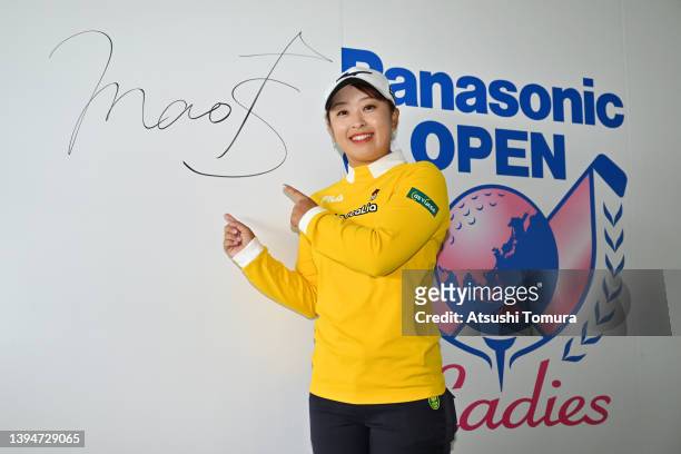 Mao Saigo of Japan poses in front of her autograph after winning the tournament following the final round of Panasonic Open Ladies at Hamano Golf...