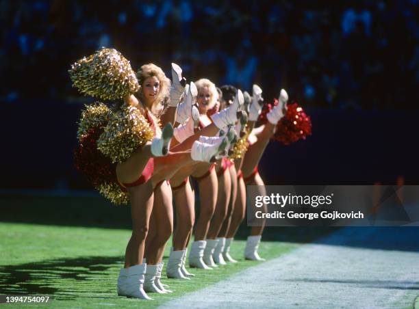 Cheerleaders for the Washington Redskins perform during a game against the St. Louis Cardinals at RFK Stadium on October 19, 1986 in Washington, DC....