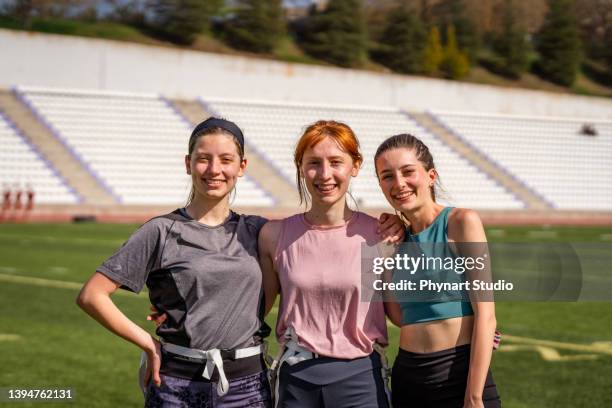 smiling  players on the  field - agility ladder stock pictures, royalty-free photos & images