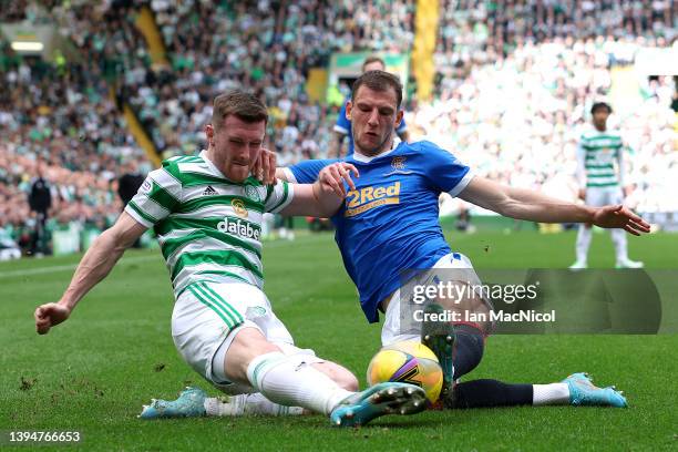 Anthony Ralston of Celtic is challenged by Borna Barisic of Rangers during the Cinch Scottish Premiership match between Celtic and Rangers at Celtic...