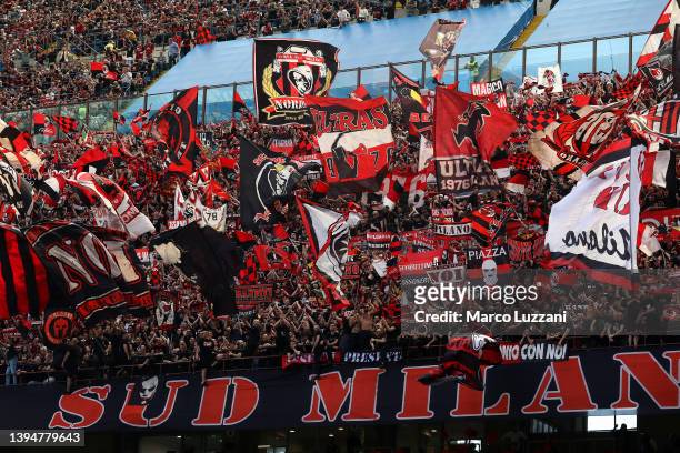 Milan fans show their support prior to the Serie A match between AC Milan and ACF Fiorentina at Stadio Giuseppe Meazza on May 01, 2022 in Milan,...