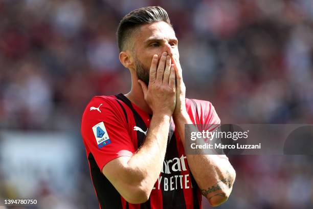 Olivier Giroud of AC Milan reacts after a missed chance during the Serie A match between AC Milan and ACF Fiorentina at Stadio Giuseppe Meazza on May...