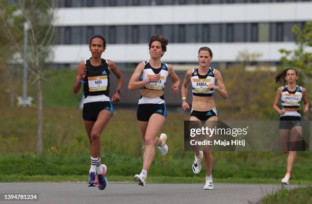 Miriam Dattke of Germany, Marta Perez of Spain and Rabea Schoeneborn compete at Women's 5km Race. World class road runners compete at the second...