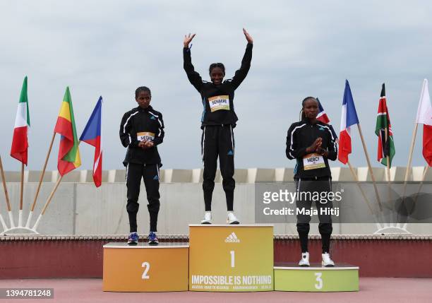 Senbere Teferi of Ethiopia, Mercy Cherono of Kenia and Medina Eisa of Ethiopia celebrate on podium after Women's 5km Race. World class road runners...