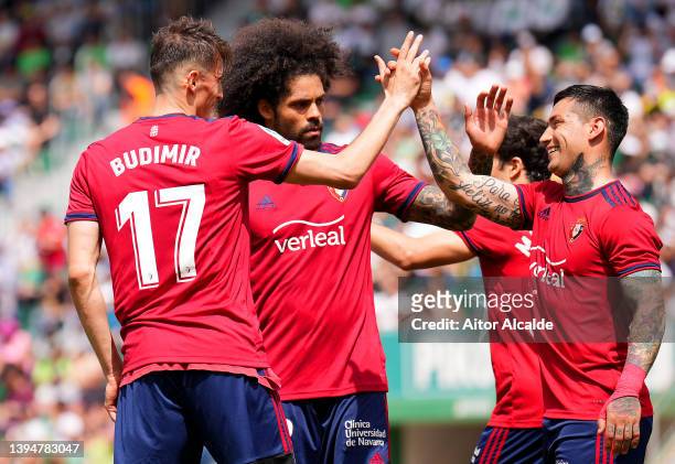 Ante Budimir of CA Osasuna celebrates scoring their side's first goal from a penalty with teammate Ezequiel Avila during the LaLiga Santander match...