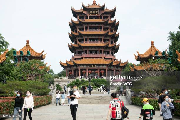 Tourists visit the Yellow Crane Tower during the May Day holiday on May 1, 2022 in Wuhan, Hubei Province of China.
