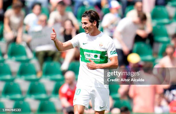 Pere Milla of Elche CF celebrates scoring their side's first goal during the LaLiga Santander match between Elche CF and CA Osasuna at Estadio Manuel...