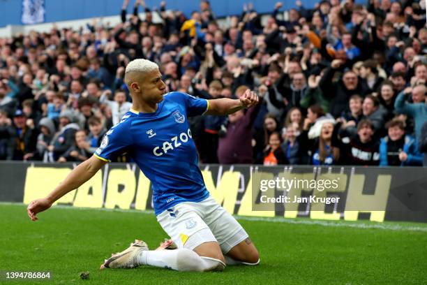Richarlison of Everton celebrates after scoring their team's first goal during the Premier League match between Everton and Chelsea at Goodison Park...
