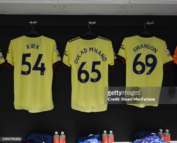 Alex Kirk, Salah-Eddine and Zak Swanson shirts hang in the Arsenal changing room before the Premier League match between West Ham United and Arsenal...