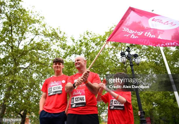 Sir Andrew Strauss starts the Ruth Strauss Foundation run with sons Sam and Luca during the Vitality Westminster Mile on May 01, 2022 in London,...