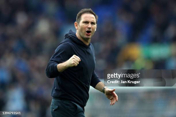 Frank Lampard, Manager of Everton, celebrates their side's win with the crowd after the final whistle of the Premier League match between Everton and...