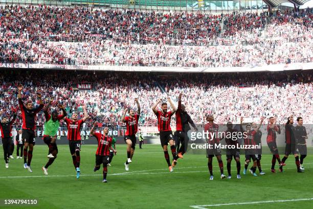 Milan players celebrate with the fans after their sides victory during the Serie A match between AC Milan and ACF Fiorentina at Stadio Giuseppe...