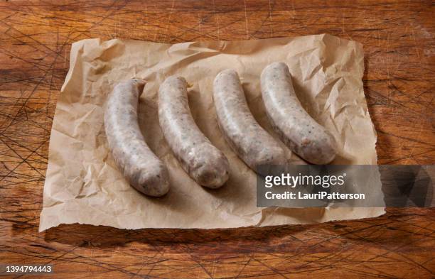 raw bratwurst sausages - raw sausages stock pictures, royalty-free photos & images