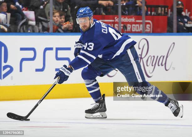 Kyle Clifford of the Toronto Maple Leafs skates with the puck against the Boston Bruins during an NHL game at Scotiabank Arena on April 29, 2022 in...