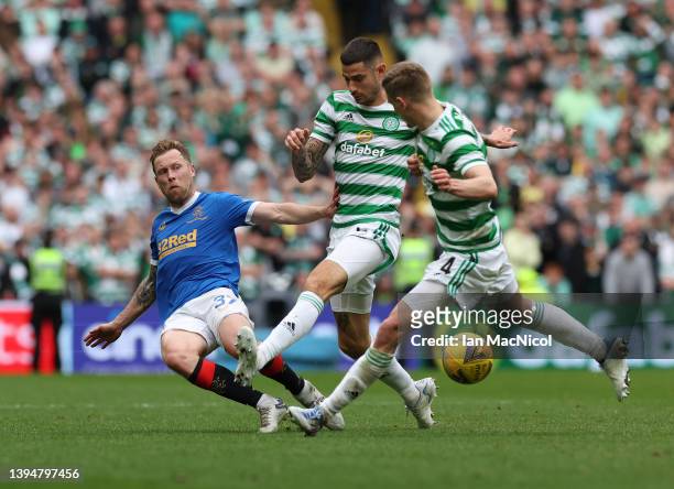 Scott Arfield of Rangers vies with Nir Bitton of Celtic during the Cinch Scottish Premiership match between Celtic and Rangers at Celtic Park on May...