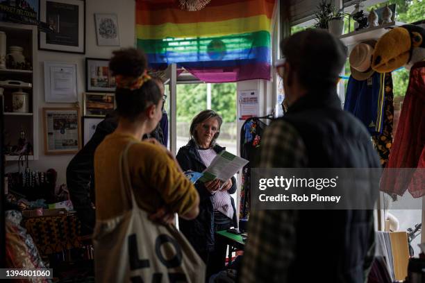 Member of the public reads an election leaflet at Kath's Place in Deptford, on May 01, 2022 in London, England. Independent candidates Jasmine...