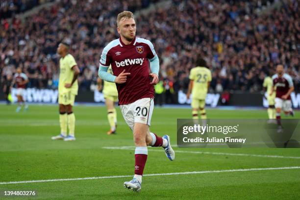 Jarrod Bowen of West Ham United celebrates scoring their side's first goal during the Premier League match between West Ham United and Arsenal at...