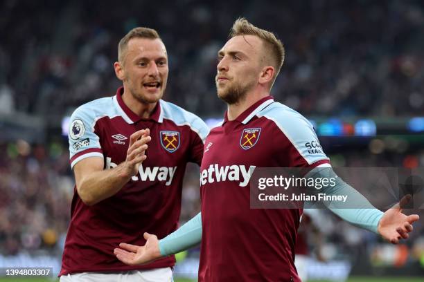 Jarrod Bowen of West Ham United celebrates scoring their side's first goal with teammate Vladimr Coufal during the Premier League match between West...