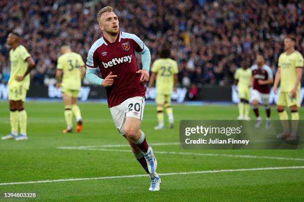 Jarrod Bowen of West Ham United celebrates scoring their side's first goal during the Premier League match between West Ham United and Arsenal at...