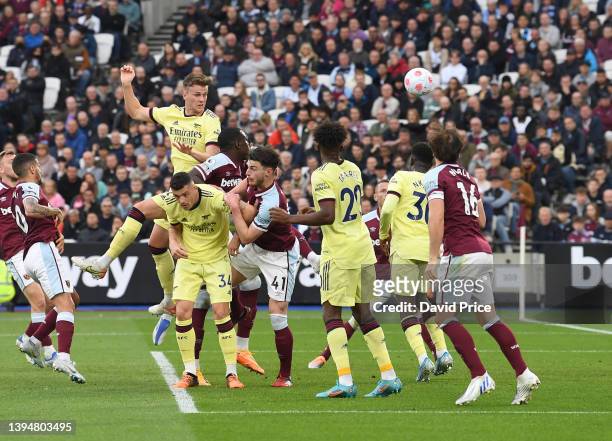 Rob Holding scores a goal for Arsenal during the Premier League match between West Ham United and Arsenal at London Stadium on May 01, 2022 in...