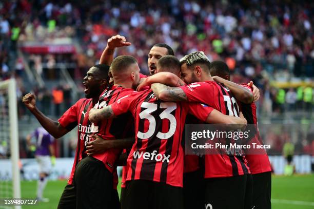 Rafael Leao of AC Milan celebrates his first goal with his teammates during the Serie A match between AC Milan and ACF Fiorentina at Stadio Giuseppe...