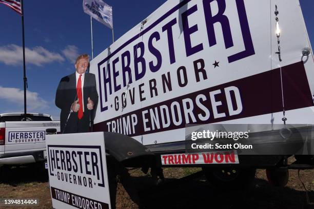 Campaign posters supporting Nebraska candidate for governor Charles Herbster decorate the grounds of the I-80 Speedway prior to the start of a rally...