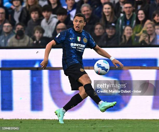 Alexis Sanchez of FC Internazionale in action during the Serie A match between Udinese Calcio and FC Internazionale at Dacia Arena on May 01, 2022 in...