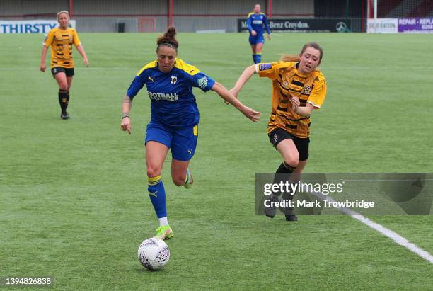 Ashlee Hincks of AFC Wimbledon Ladies evades the Cambridge United Women defence during the FA Women's National Division One South East match between...