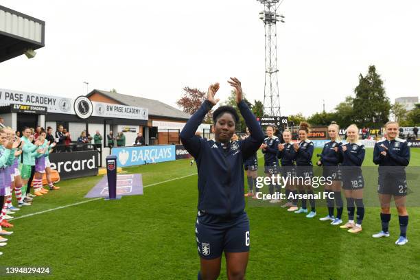 Anita Asante of Aston Villa walks through a guard of honour from players of Arsenal and Aston Villa in recognition of her upcoming retirement at the...