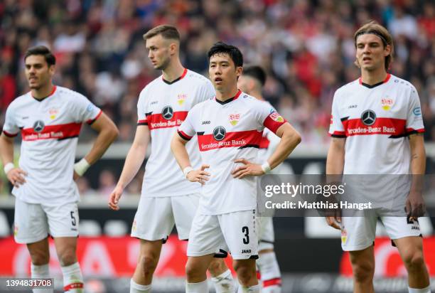 Wataru Endo of VfB Stuttgart and his teammates show their disappointment during the Bundesliga match between VfB Stuttgart and VfL Wolfsburg at...