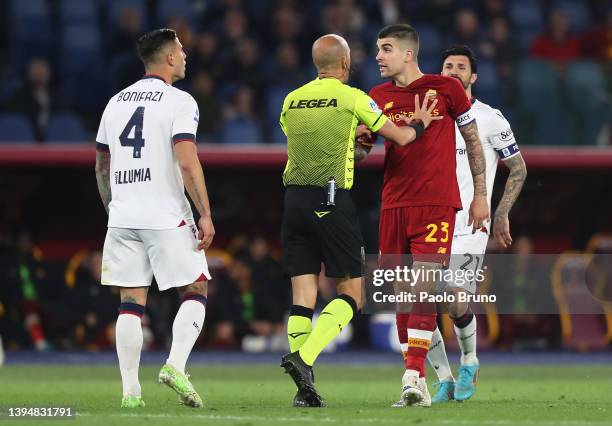 Gianluca Mancini of AS Roma clashes with Kevin Bonifazi of Bologna during the Serie A match between AS Roma and Bologna FC at Stadio Olimpico on May...