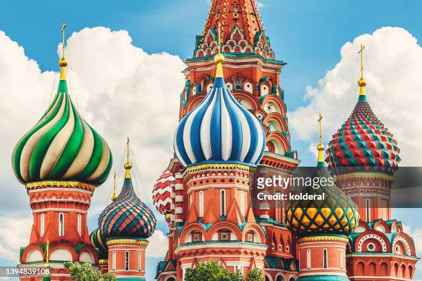 saint basil cathedral, beautiful colorful cupola against sky, famous  russian landmark on red square in center of moscow - russian orthodox stock-fotos und bilder