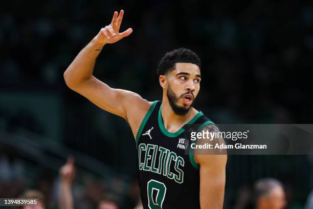 Jayson Tatum of the Boston Celtics blows a kiss to the crowd as he reacts after hitting a three-point shot during Game One of the Eastern Conference...