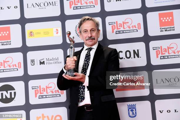 Alfredo Castro holds the Best Supporting Actor Award for the film "Karnawal" during Platino Awards for Ibero-American Cinema 2022 at IFEMA Palacio...