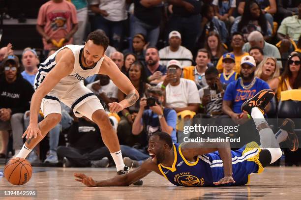 Draymond Green of the Golden State Warriors and Kyle Anderson of the Memphis Grizzlies fight for the ball during Game One of the Western Conference...