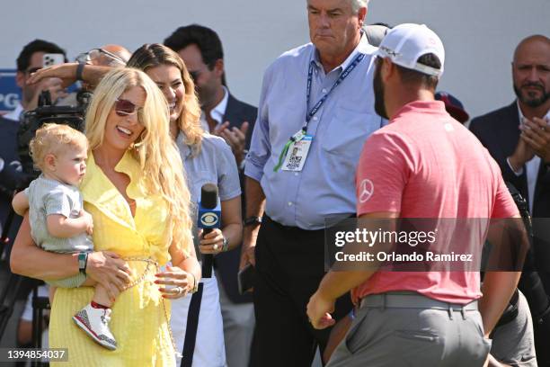 Jon Rahm of Spain greets his wife Kelley Cahill and their son Kepa after winning the Mexico Open at Vidanta 2022 on May 01, 2022 in Puerto Vallarta,...